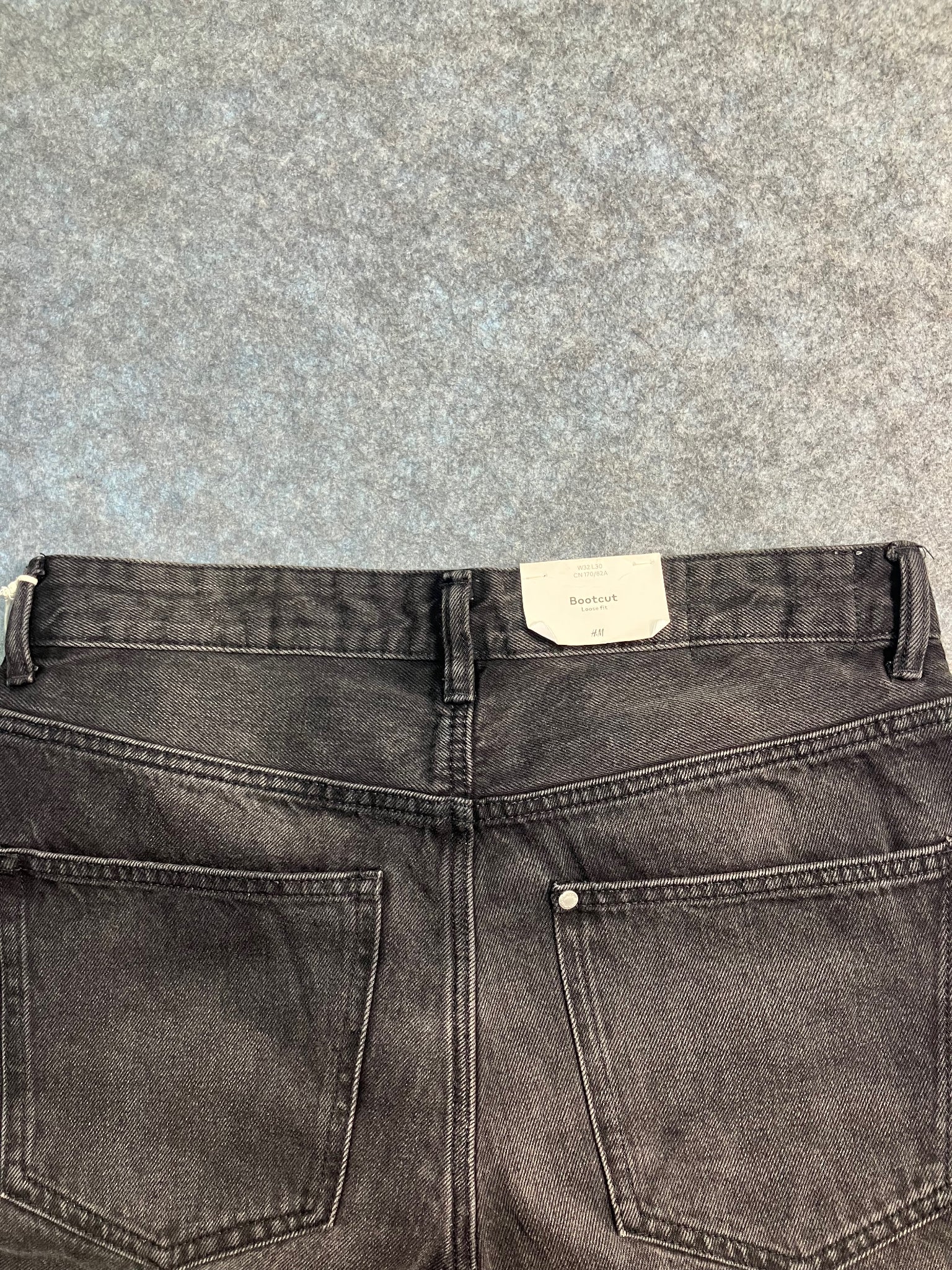 black boot-cut jeans