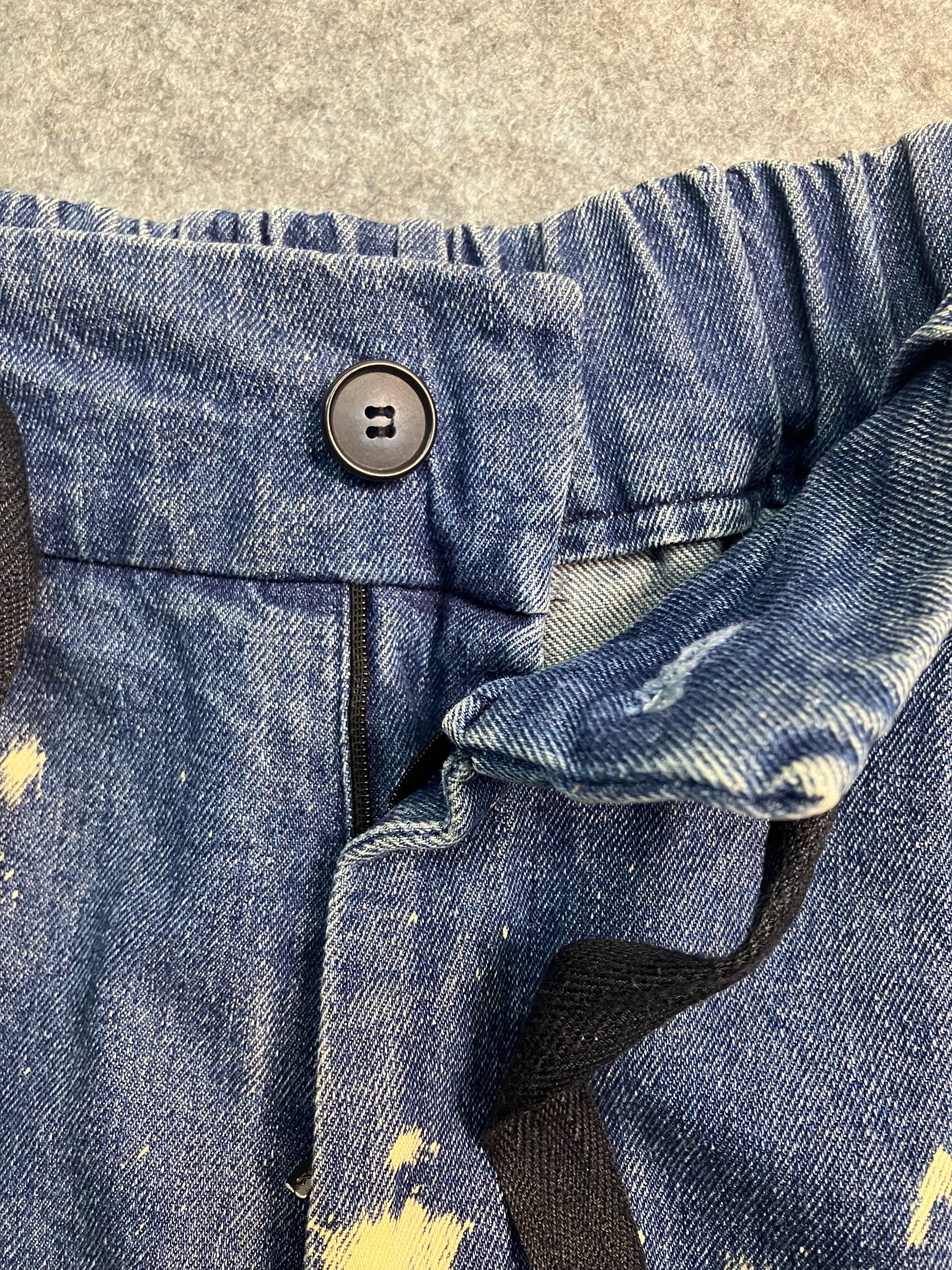 blue paint-stain balloon jeans