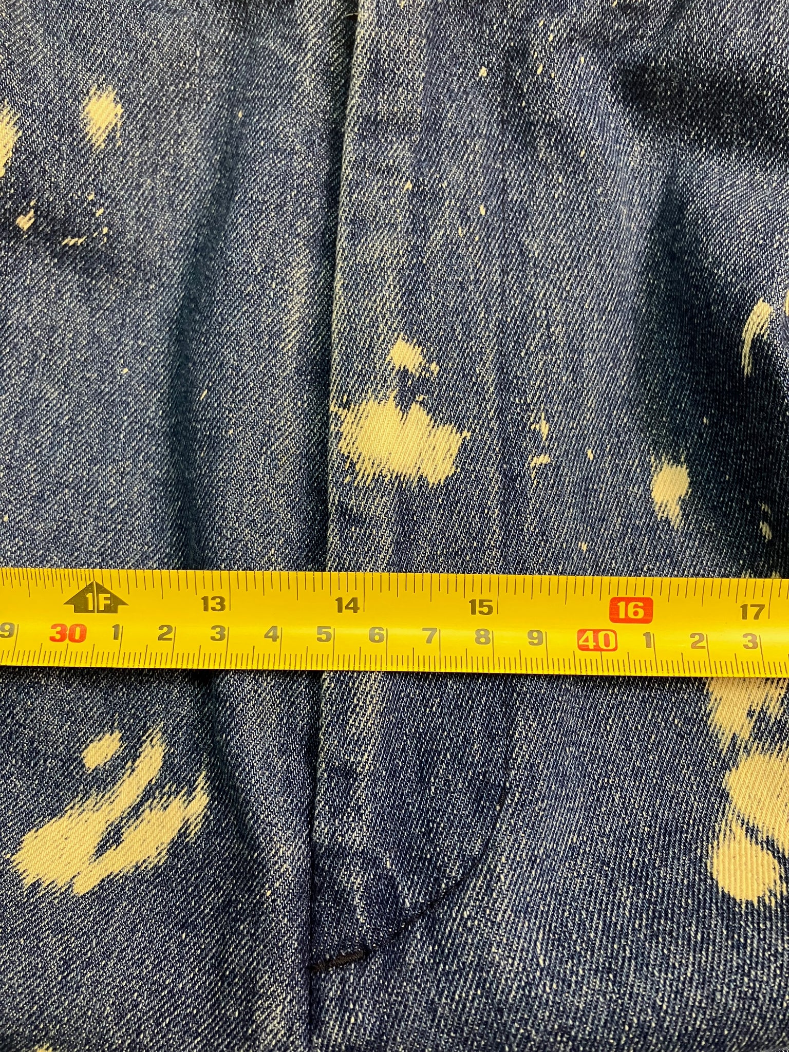 blue paint-stain balloon jeans