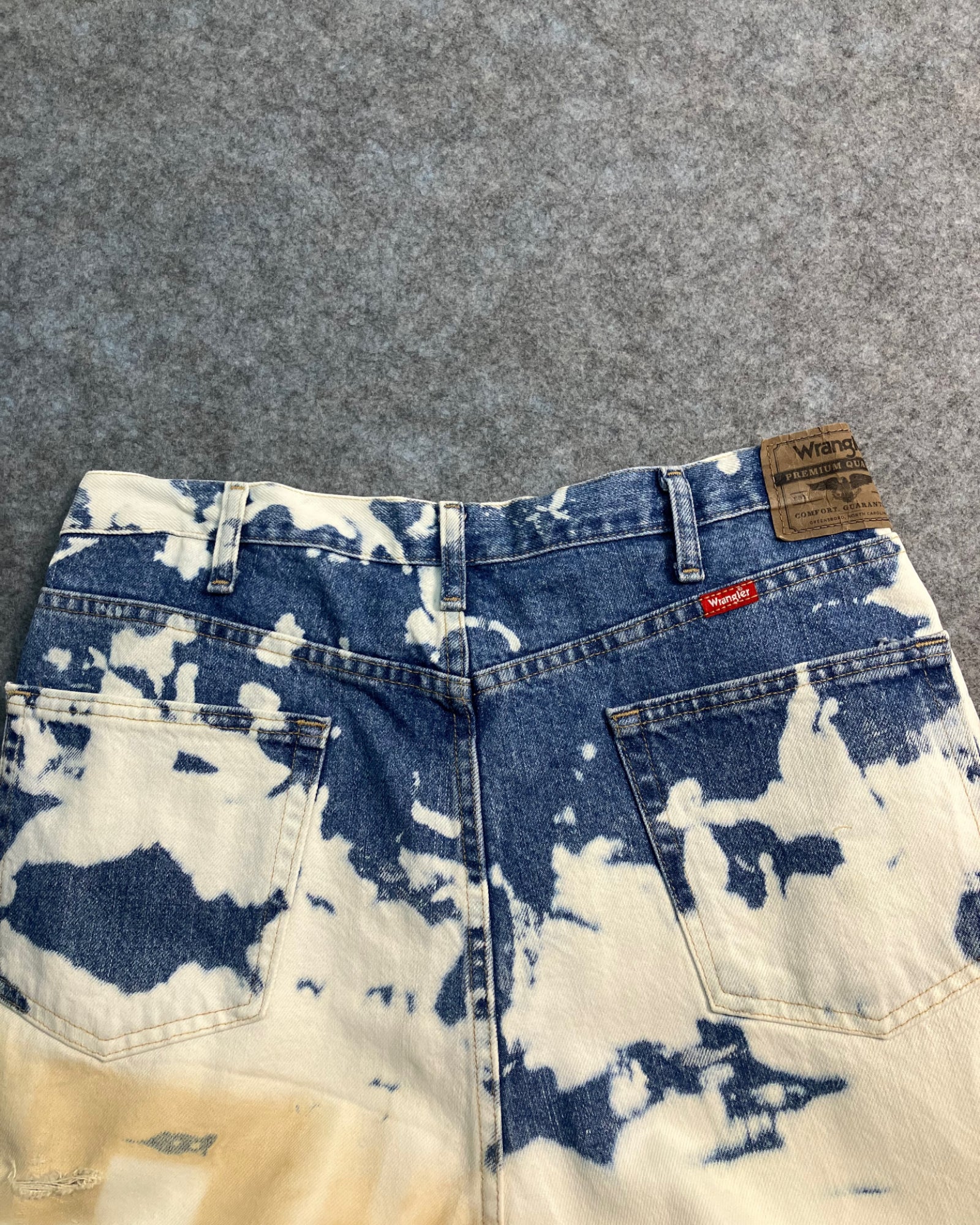 blue reworked paint-stain regular-fit jeans