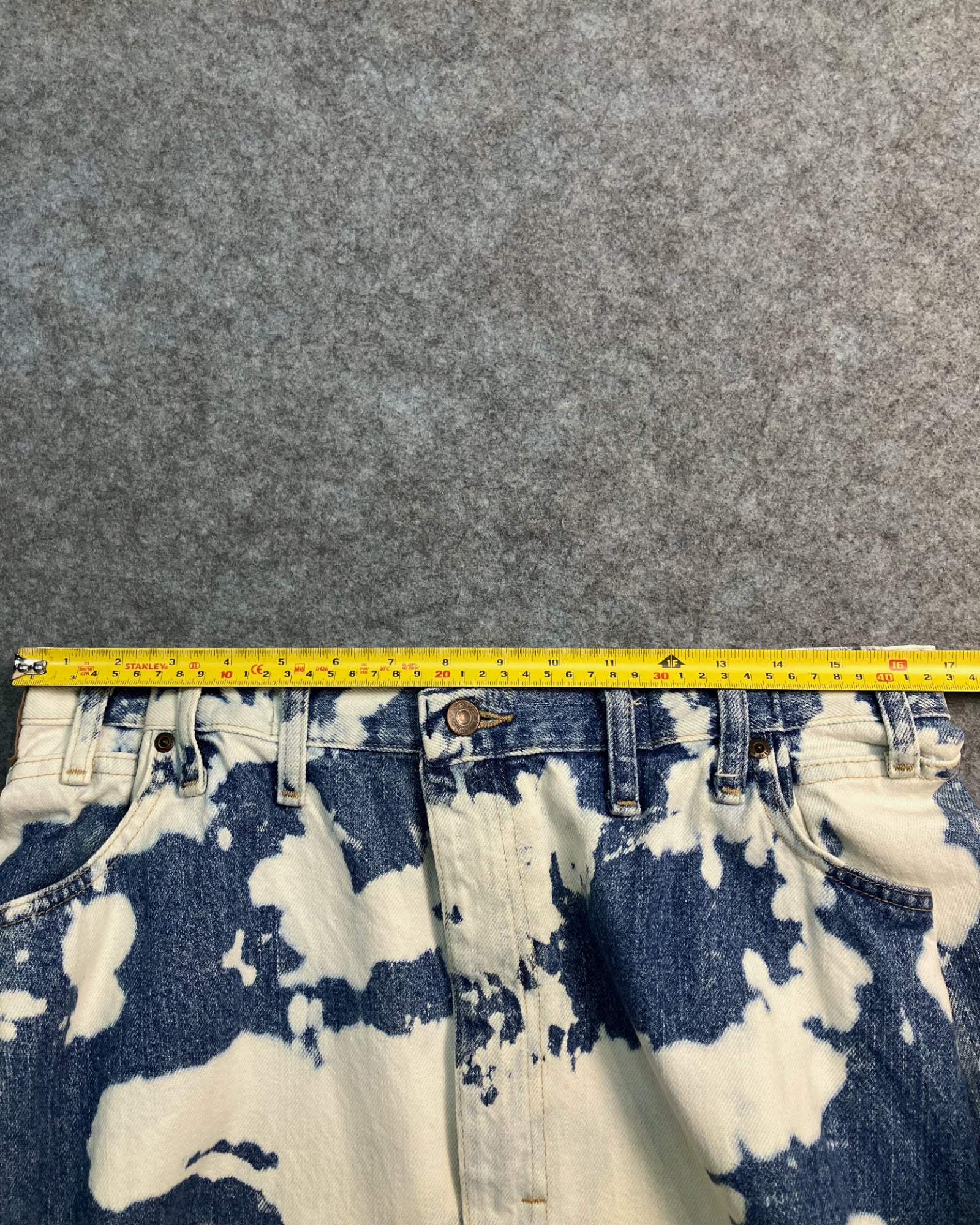 blue reworked paint-stain regular-fit jeans