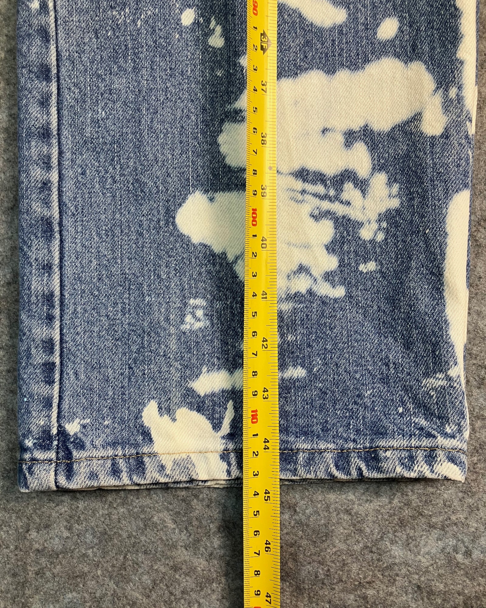 blue reworked paint-stain regular-fit jeans