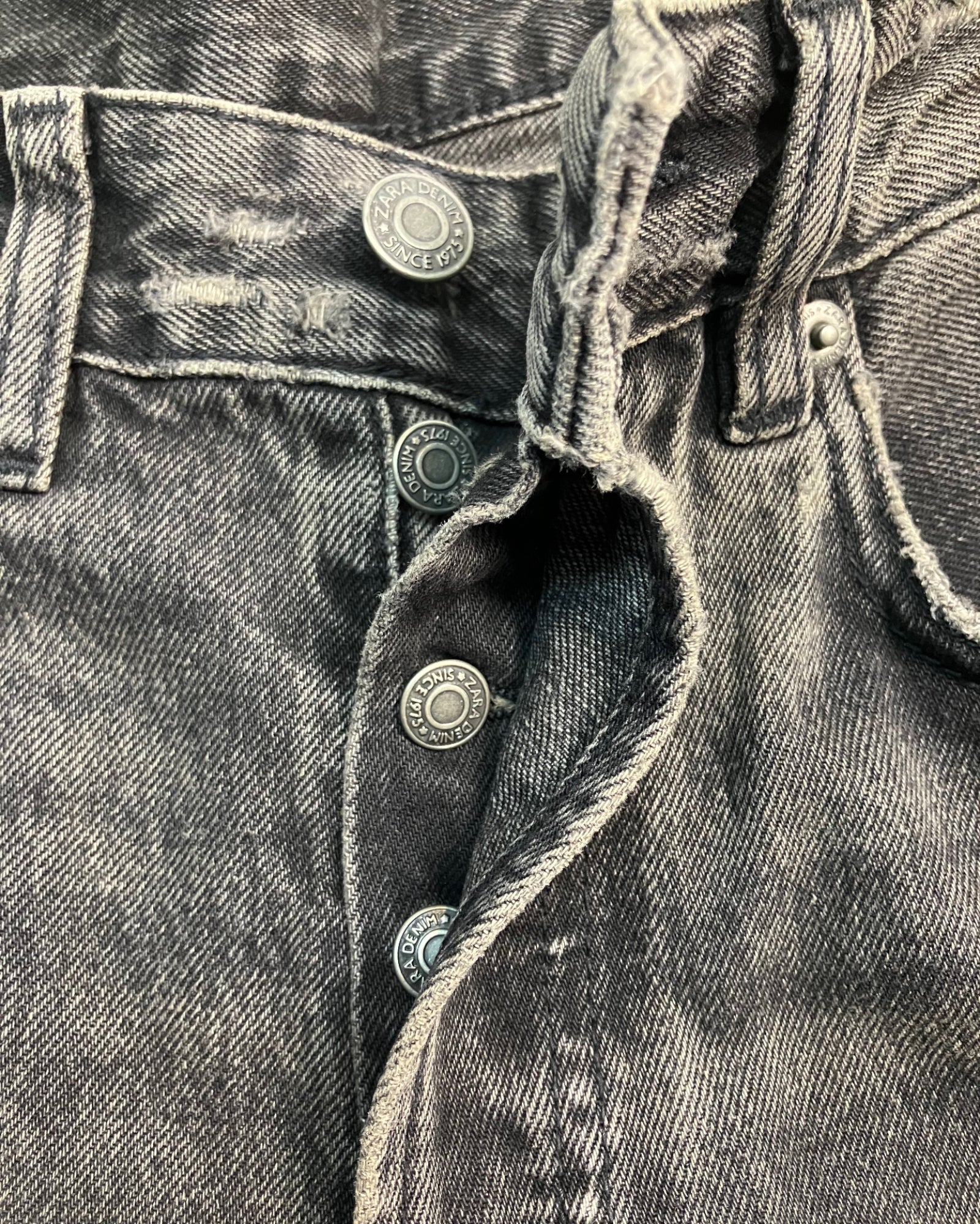 black patched straight-fit jeans