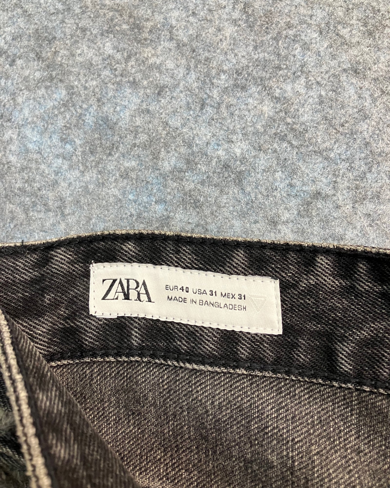 black patched straight-fit jeans