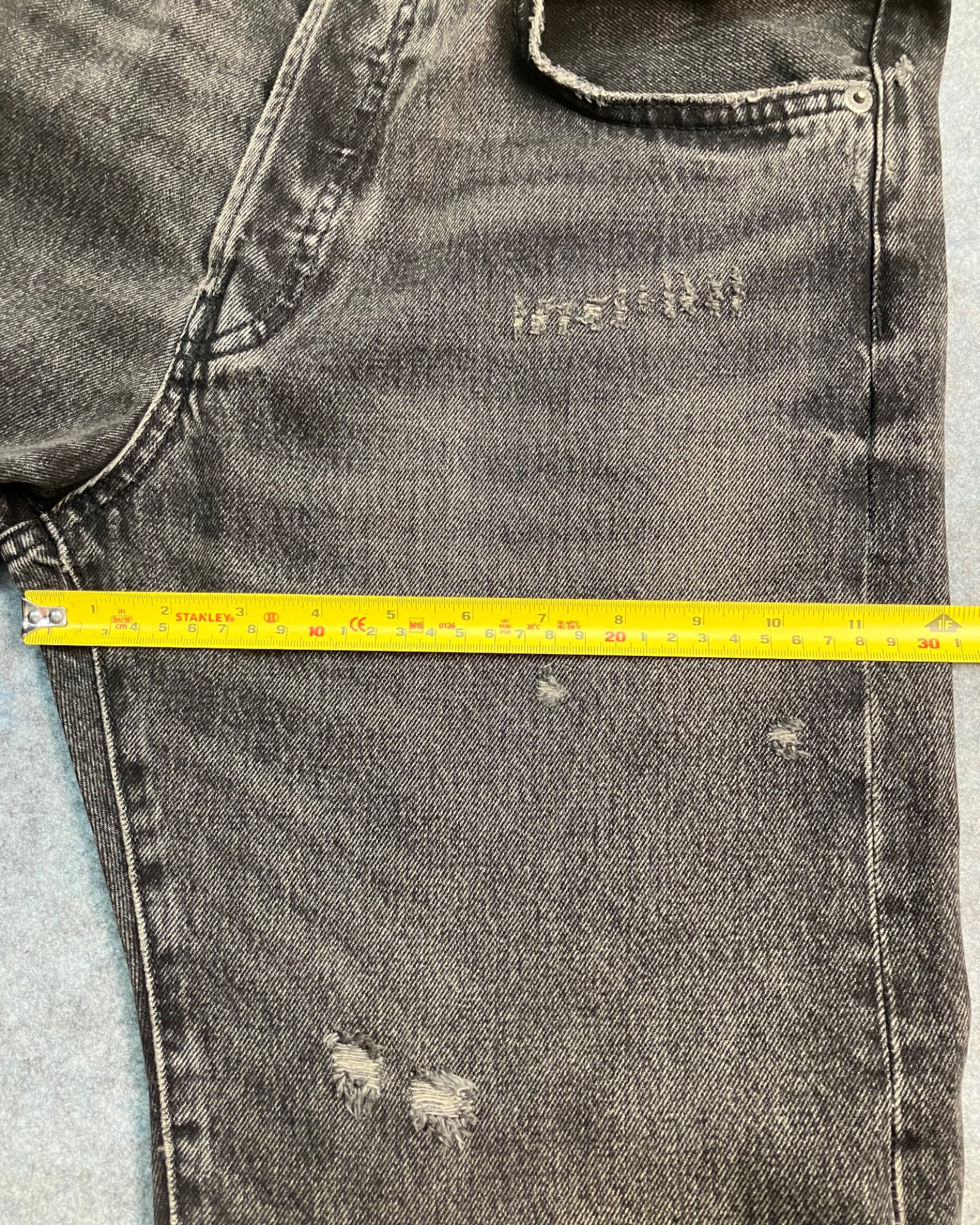 black patched straight-fit jeans