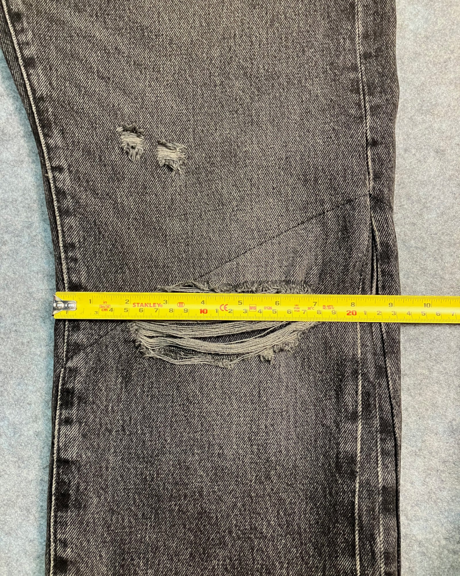 black patched straight-fit jeans