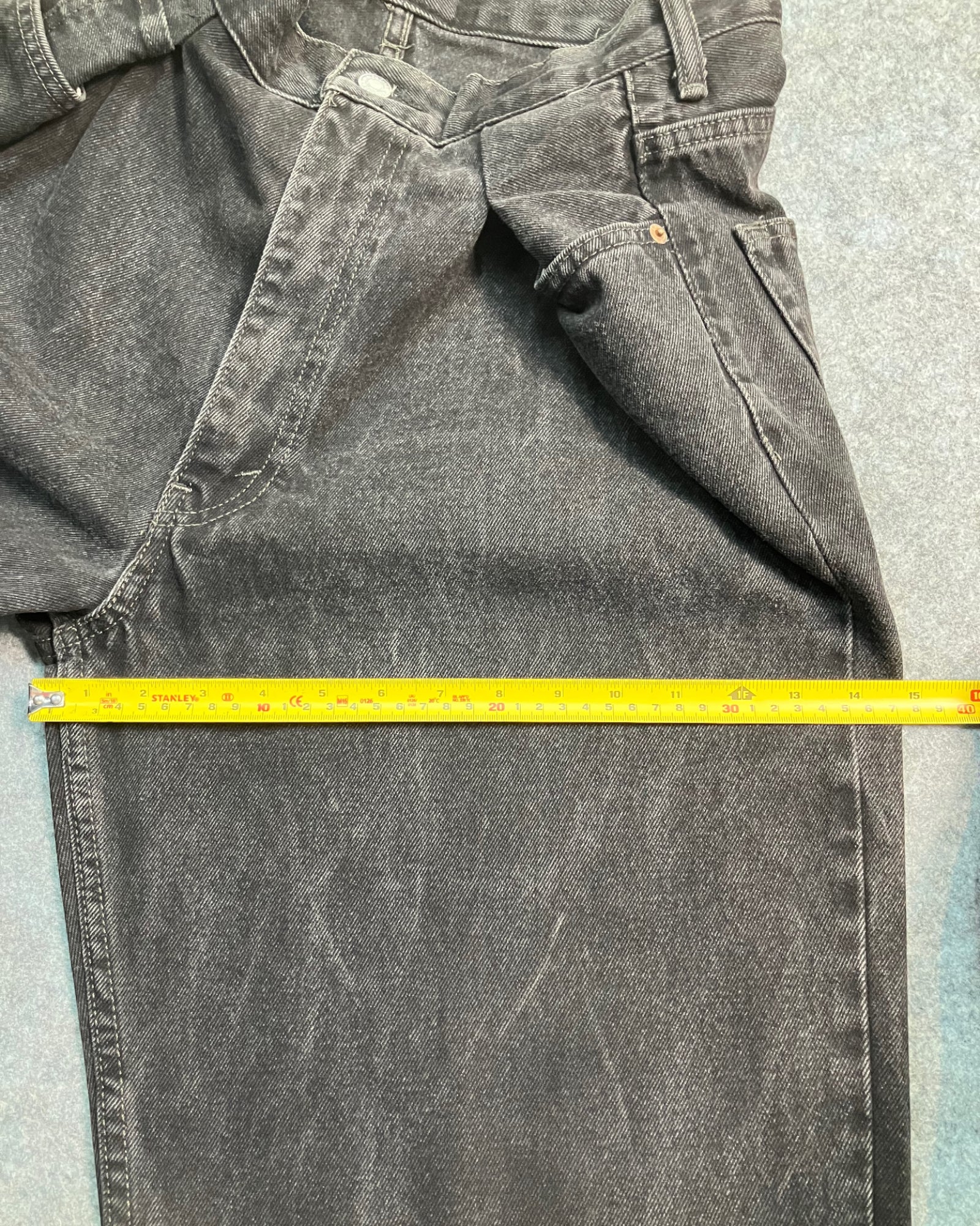 black reworked regular-fit jeans