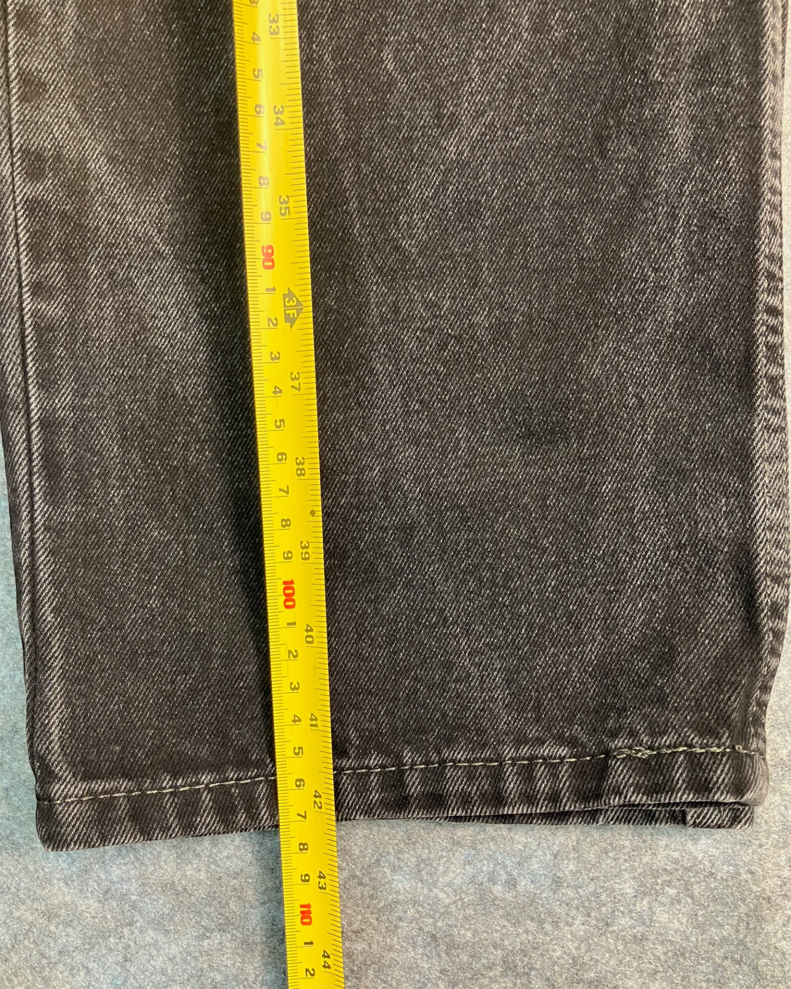 black reworked regular-fit jeans