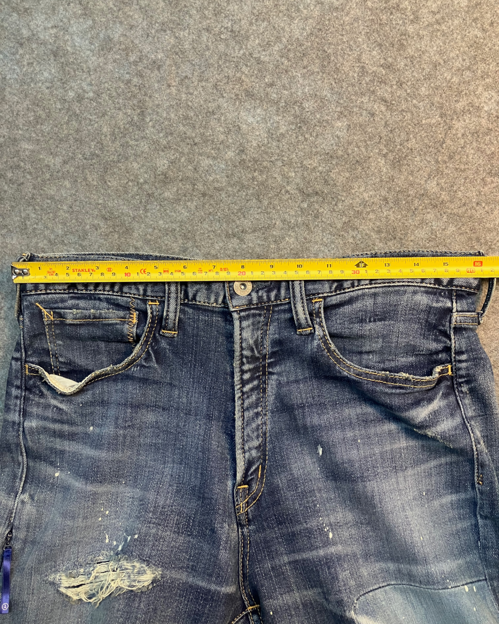 blue distressed skinny jeans