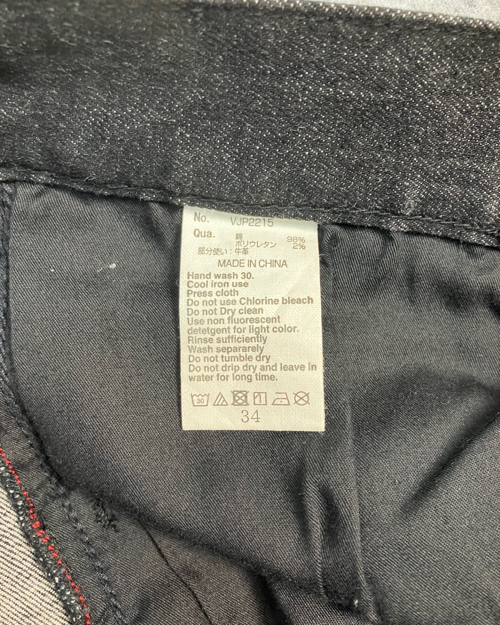 black distressed slim-fit jeans