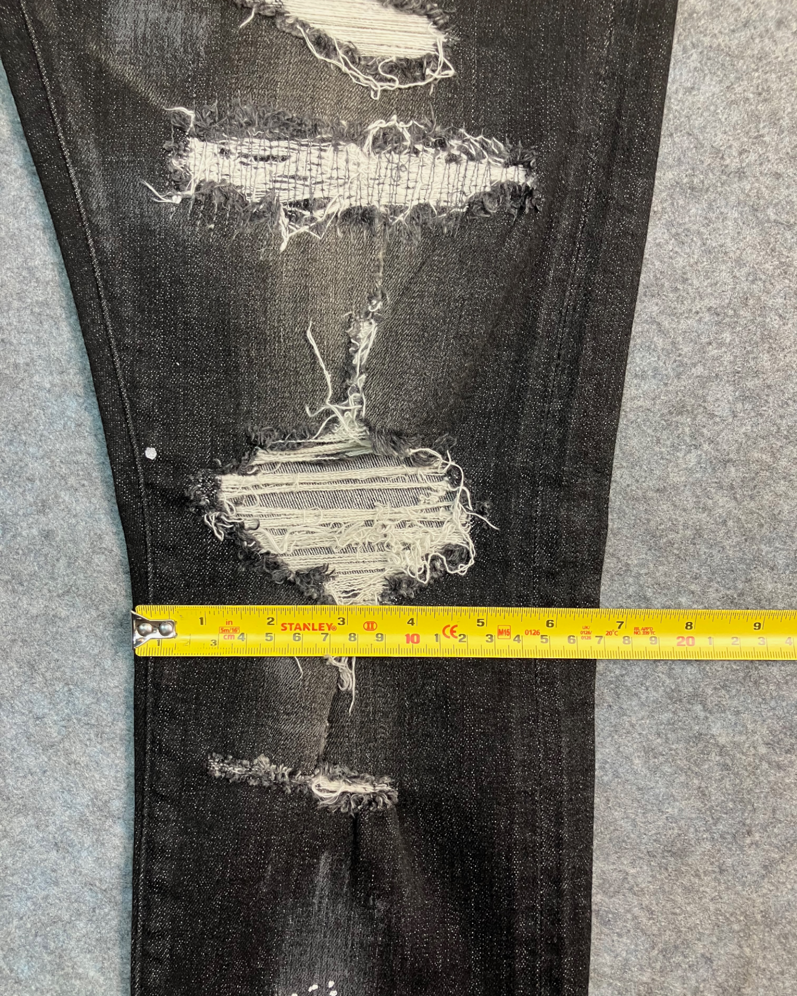 black distressed slim-fit jeans