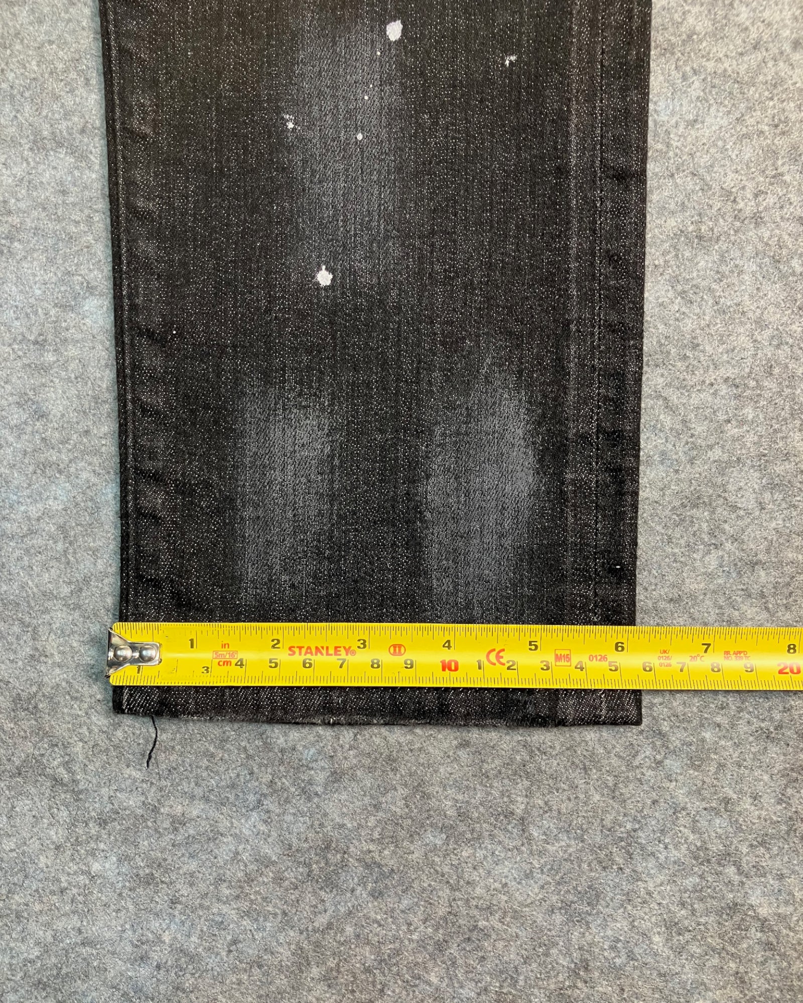 black distressed slim-fit jeans