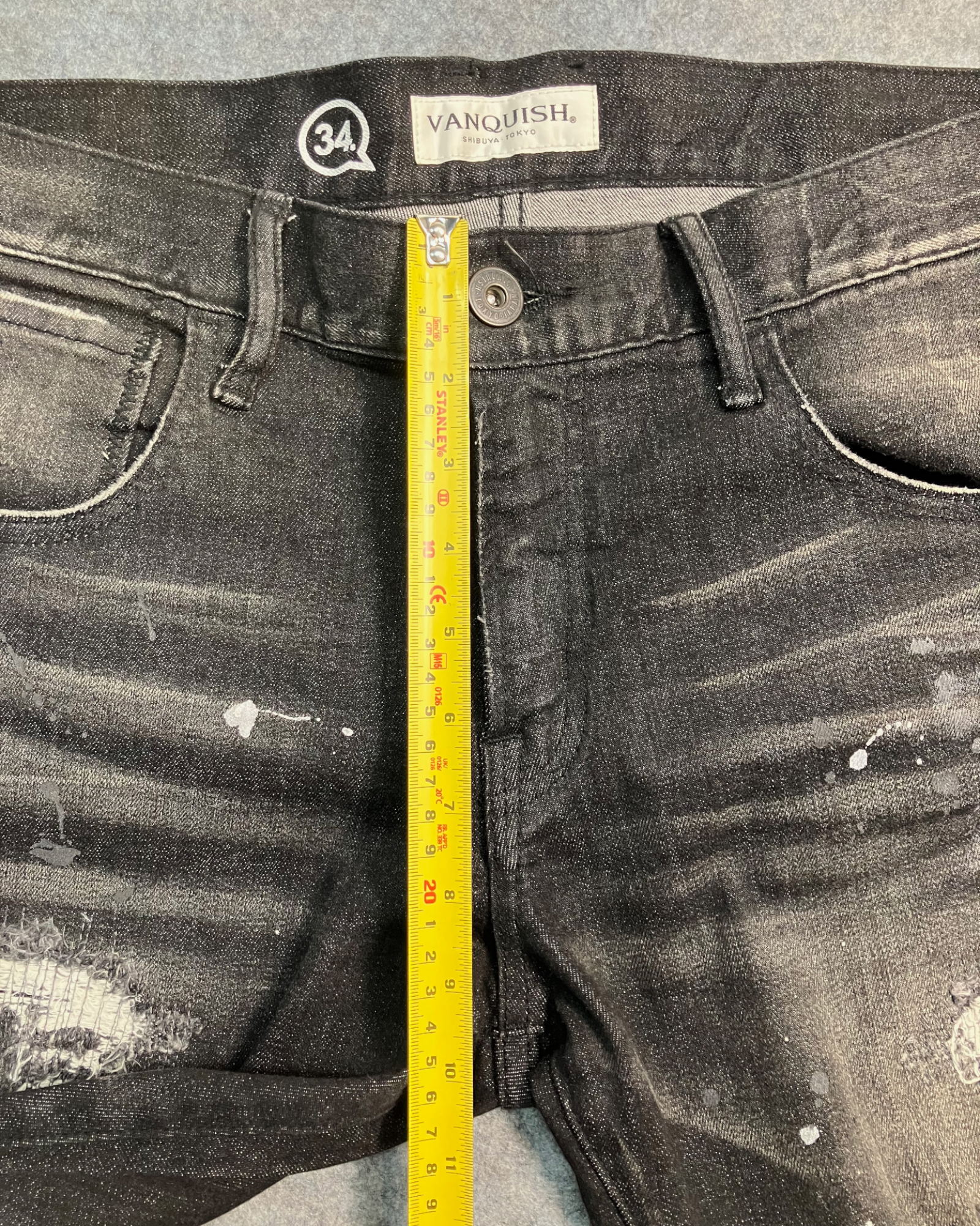 black distressed slim-fit jeans