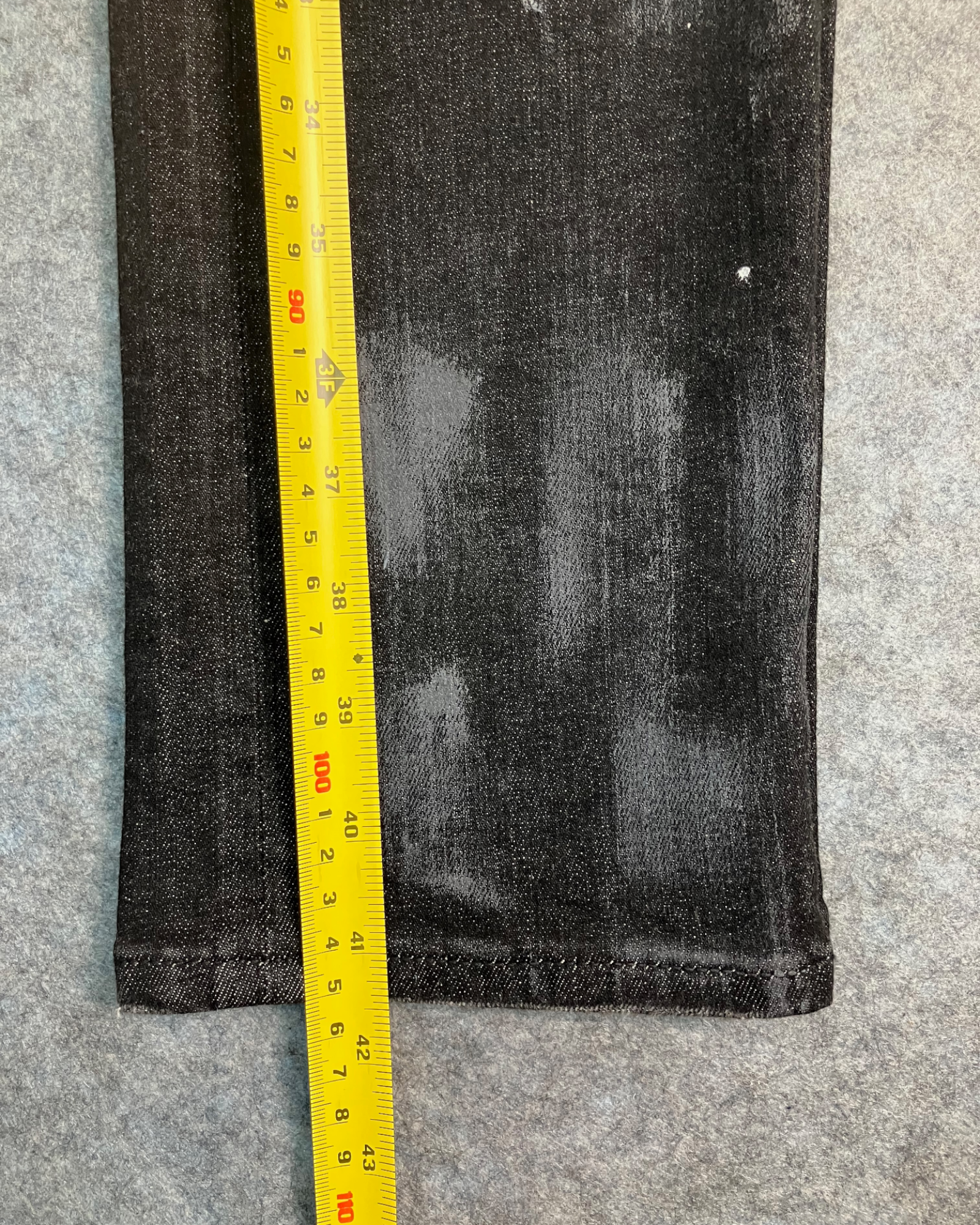 black distressed slim-fit jeans