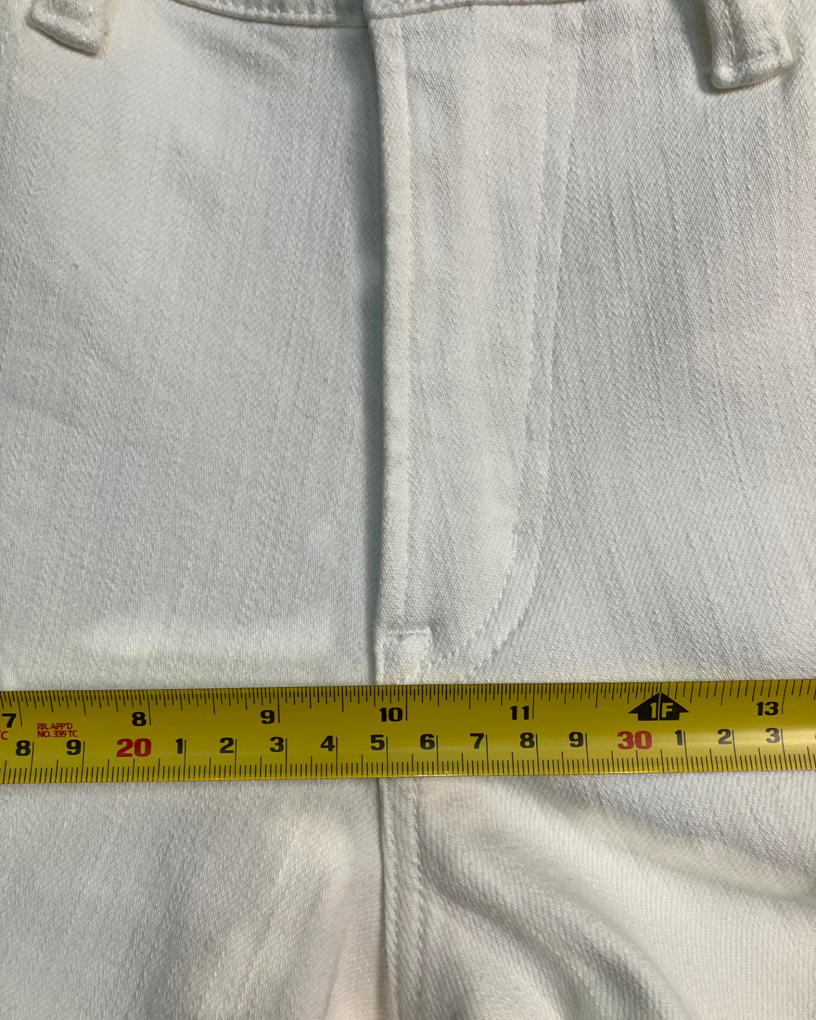 white distressed slim-fit jeans