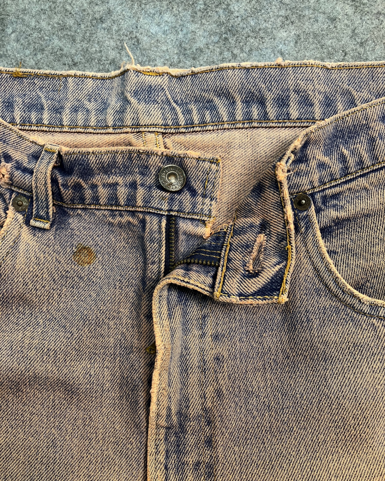 red reworked wash regular-fit jeans