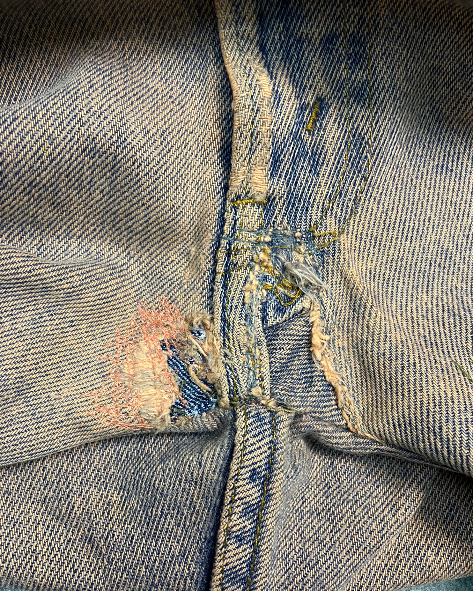 red reworked wash regular-fit jeans