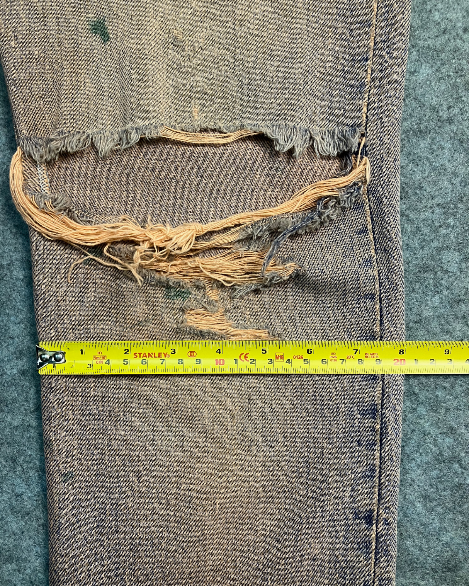 red reworked wash regular-fit jeans